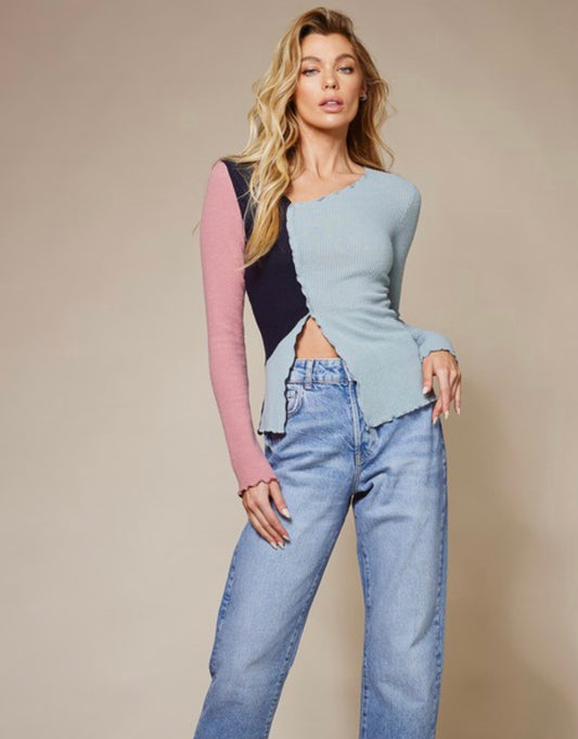 ASYMMETRICAL BUTTON TOP